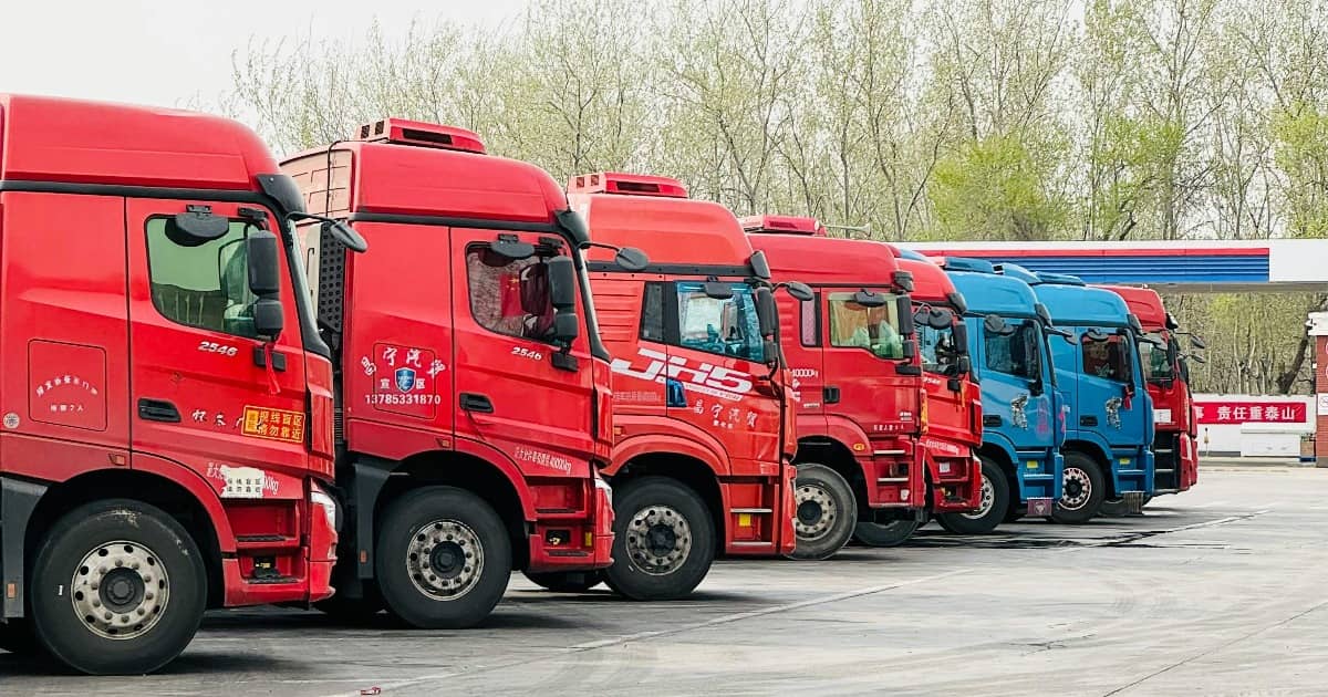 Logistics truck fleet on highway